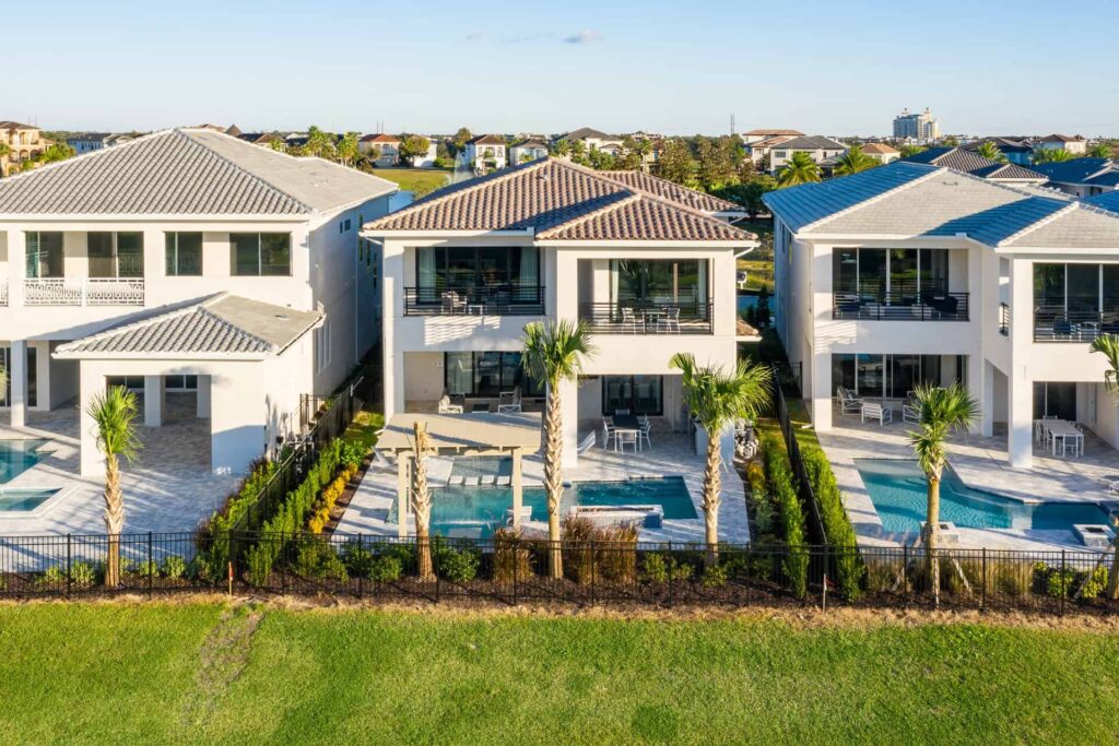 Row of luxury resort homes, each with private pools and covered balconies